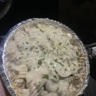 a pie with cheese and herbs