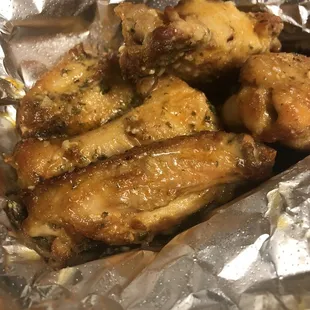 chicken wings wrapped in foil