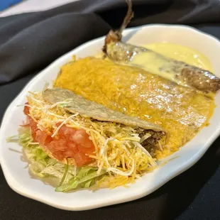 COMBINATION #5
A crispy beef taco, an enchilada and a chile relleno (mild Anaheim pepper)
