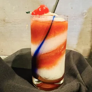 Ask about RICARDOS Drink of the Month. 

This photo shows the Cherry Bomb Margarita.