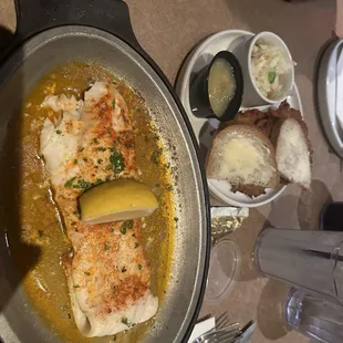 Baked fish with potato pancakes