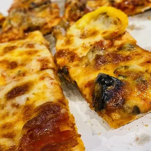 Pepperoni. Sausage with black olives and banana peppers.