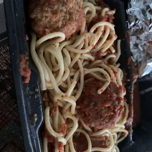 Full order of spaghetti and meatballs with almost no sauce! Not worth it.