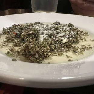 Herb and oil dip for bread.