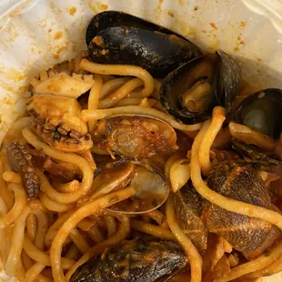 spaghetti al scoglio (amazing! half eaten, picture doesn&apos;t do it justice)