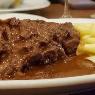 Braised beef short ribs with parmesan pappardelle