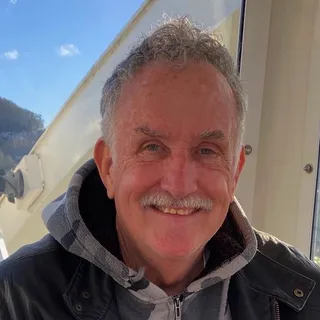 John E.