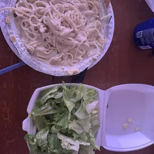 Salad (I just lettuce) noodles swimming in sauce with no flavor taste like was put in microwave and served as is