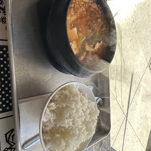 a bowl of rice and a bowl of soup