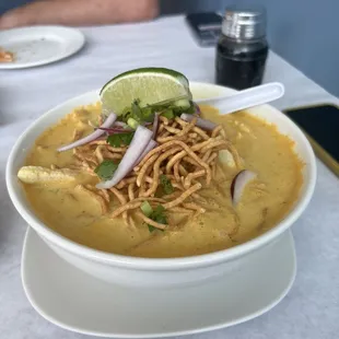 Coconut Chicken Curry - loads of chicken and soft noodles, plus crunchy noodles on top!