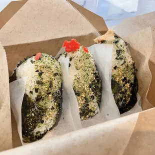 Chicken Teriyaki Onigiri, Beef Sukiyaki Onigiri, Spicy Tuna Roll (left to right)