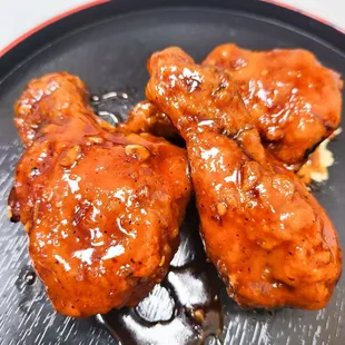 a plate of chicken wings