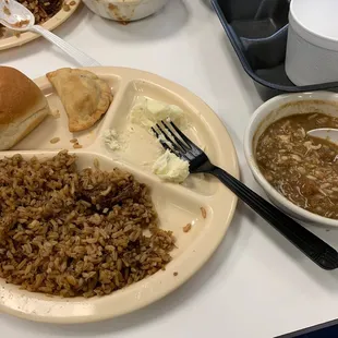 Jambalaya, seafood gumbo, mostly eaten potato salad, and 1 of 2 crawfish pies (the other already eaten!).