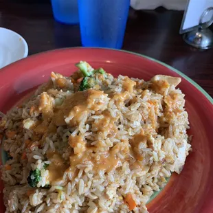 Chicken Thai fried rice with panag curry sauce poured over it