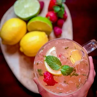 a person holding a drink