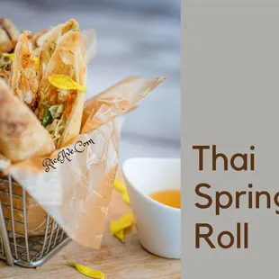 thai spring roll in a basket with dipping sauce