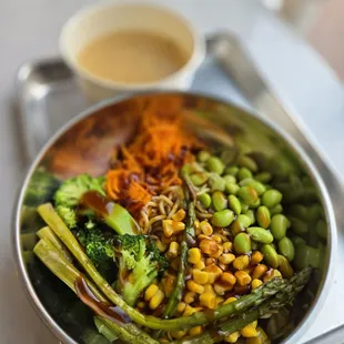 Ramen noodle bowl with fresh veggies and miso broth.