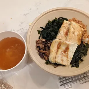 Udon noodle with plain tofu, seaweed, mushroom, fried onion and miso soup on the side.