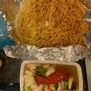 noodles and vegetables in a container