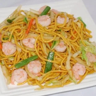 shrimp and noodles on a white plate
