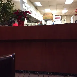 a view of a restaurant counter