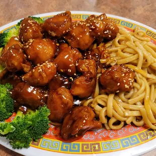 a plate of chicken and broccoli