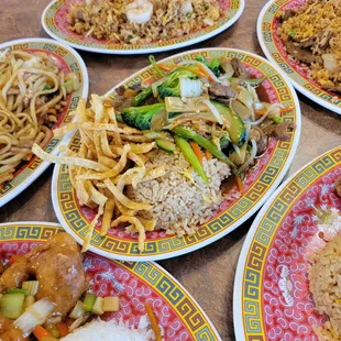 a variety of asian food on plates