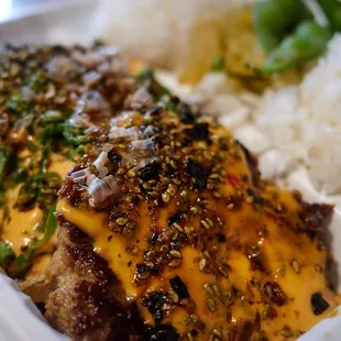 Dynamite ahi cakes (chili aioli, negi kabayaki, furikake, katuo flakes and green onions)