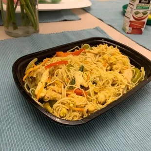 Singapore rice noodles with chicken.  Big curry flavor.  This was AFTER I ate 1/3 of it.