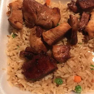 chicken and rice in a styrofoam container