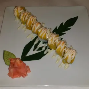 Rice cafe Maki, with mango on top.
