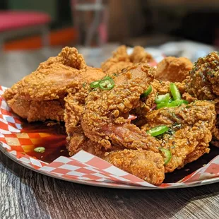 a plate of fried food on a table