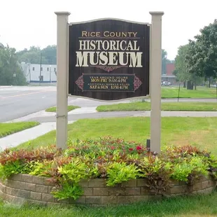 Sign along 2nd Street. Big parking lot is to the right.