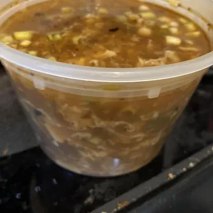 Hot and sour soup with crispy won tons it's a little bit spicy but so good