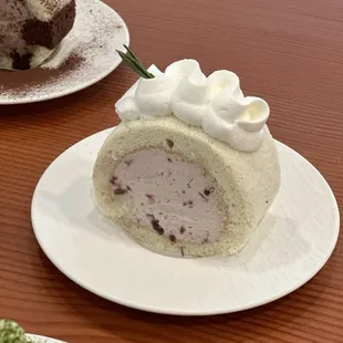 Red Blossom Cake filled with sweet red bean cream, beloved for its deep and earthy flavor, appealing to all age groups.