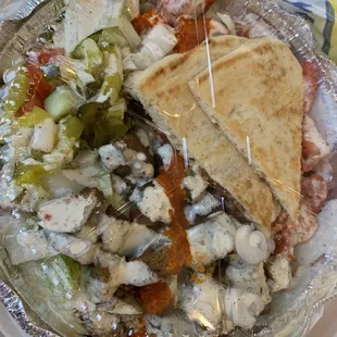 Combo chicken n gyro w 1/2 white rice n seasoned rice plus salad, white sauce, hot sauce, pita