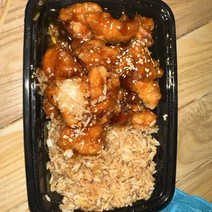 Sesame chicken (few pieces of broccoli) with fried rice