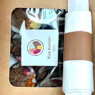 Bulgogi Kimbap packed up neatly for takeout. $10 + + tip