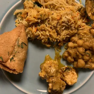 Sorry for the poor photo - samosa, veg biryani, chana masala, karaki paneer.