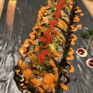 &apos;Bomberman Maki&apos; &apos;New to you &apos;
:Charcoal battered with smoke salmon, cooked eel, crab stick and get a little spice with jalapeño