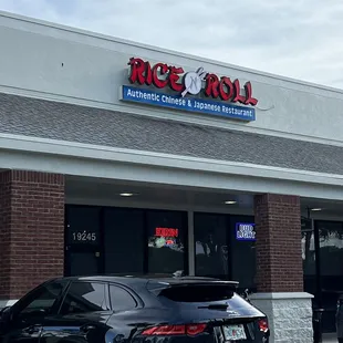 a car parked in front of a restaurant