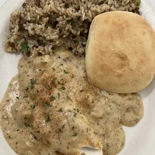 Tilapia Supreme with side of rice dressing $18