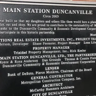 a plaque on the outside of a building