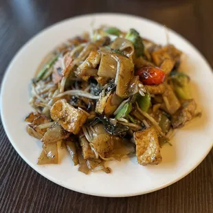 a plate of stir fried vegetables