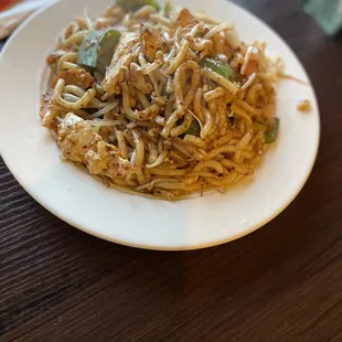 a plate of noodles on a table