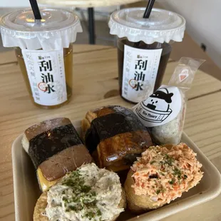 Spam egg masubi, unagi egg masubi, tuna inari, spicy crab inari, salmon onigiri, 2 herbal teas