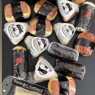 Variety of spam musubi, onigiri , inari and dessert