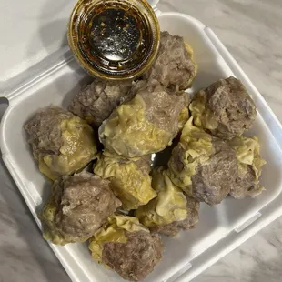 a plate of meatballs and sauce