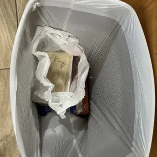 Old sour rice cake in the trash because we didn't want to get sick!!