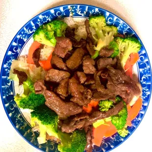 a plate of beef and broccoli
